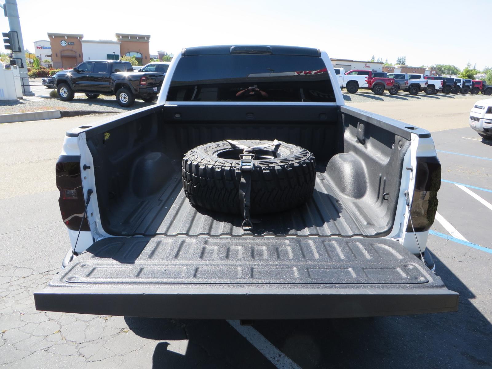 2018 White /BLACK Chevrolet Silverado 1500 LT (3GCPCREC7JG) with an 5.3L V8 OHV 16V engine, automatic transmission, located at 2630 Grass Valley Highway, Auburn, CA, 95603, (530) 508-5100, 38.937893, -121.095482 - Must see Pre Runner.... CST front lift spindals, Camburg UCA's, King Adjustable 2.5 Coil-overs, King 2.5 rear shocks, 35" Toyo RT Trail tires, 17" Method Race wheels, MZ front skid plate, G2 rear differntail cover, Full size bed mounted spare tire, Black Vinyl roof wrap, smoke tail lights and 3rd br - Photo #14